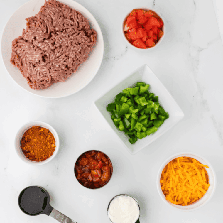 Ingredients needed for Easy Air Fryer Chicken Fritters on kitchen table.