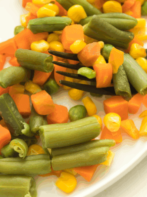 Air fryer frozen vegetables cooked to crispy perfection, ready to serve.