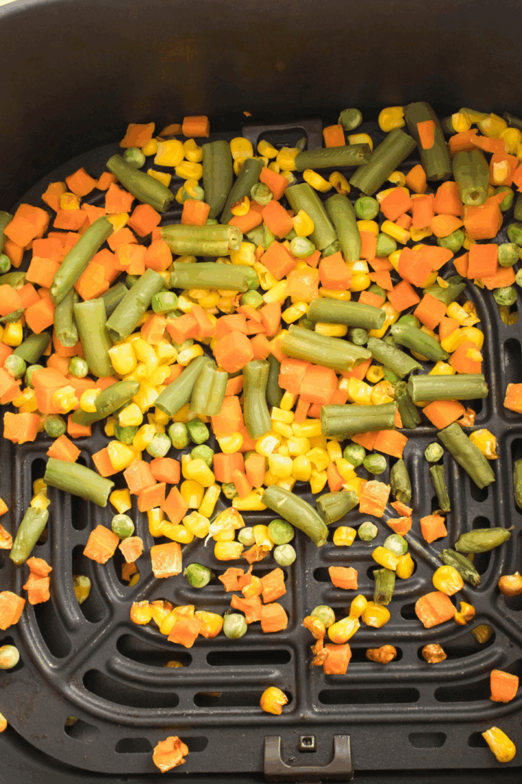 Air fryer frozen vegetables cooked to crispy perfection, ready to serve.