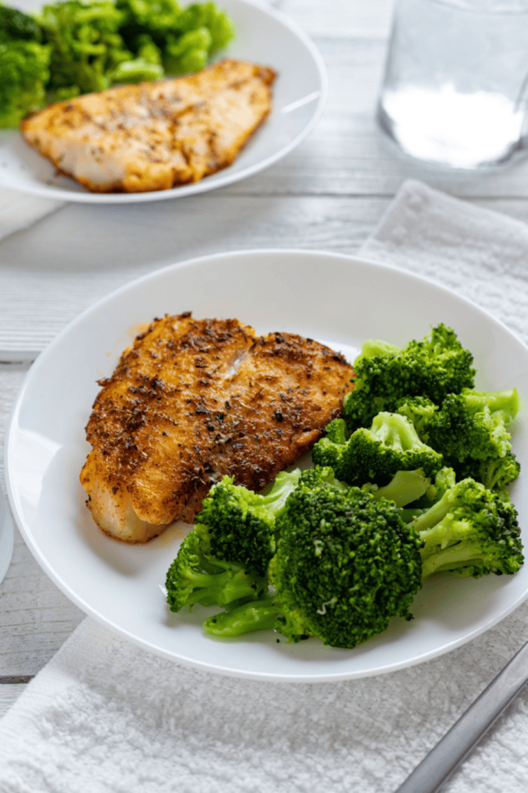 Air fryer swai fish fillets cooked without breading until tender and flaky served as a healthy easy dinner plate