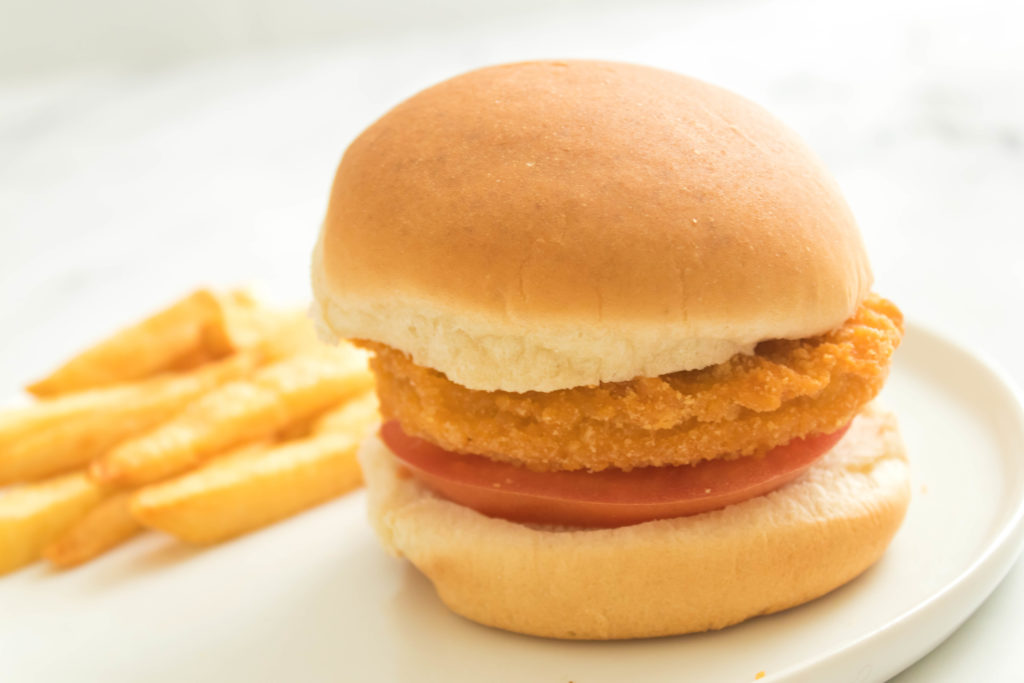 chicken patties in the air fryer cooked and on a plate