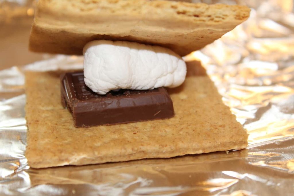 chocolate and marshmallow between two graham cracker halves
