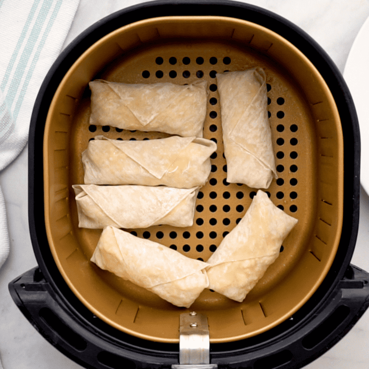 overhead: rolls in air fryer basket before you air fry the lumpia