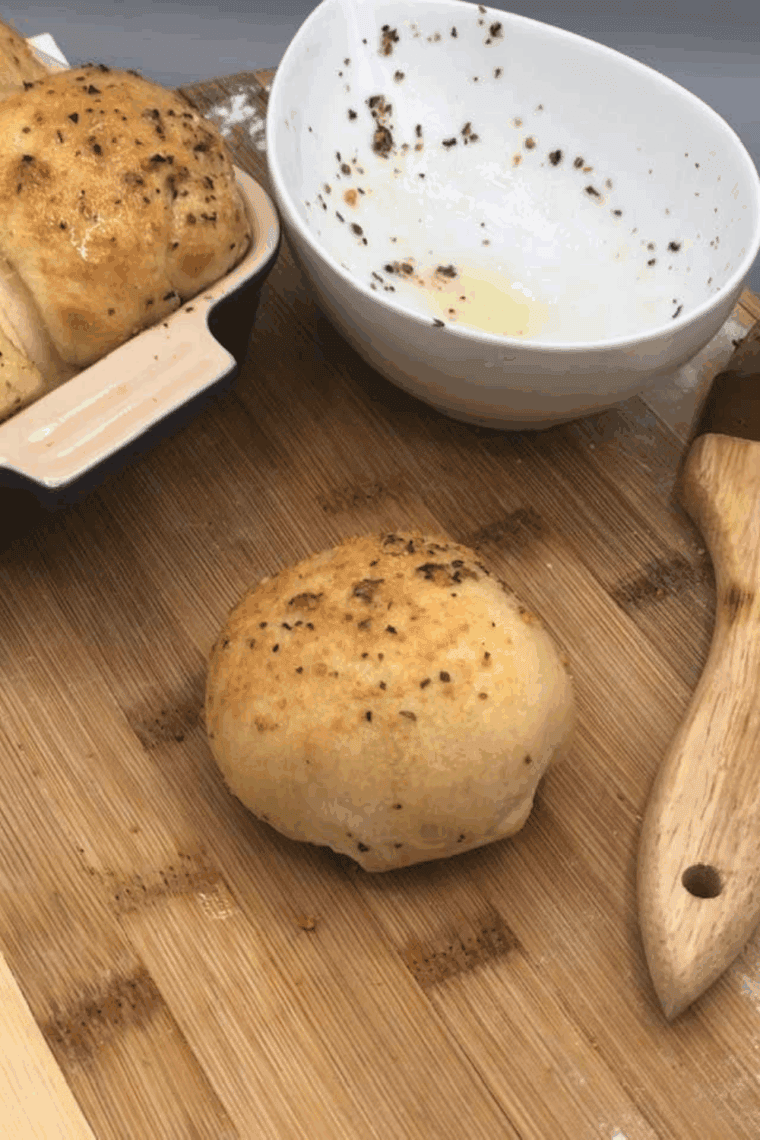 Air fryer cheese stuffed garlic rolls with golden crust and melted cheese.