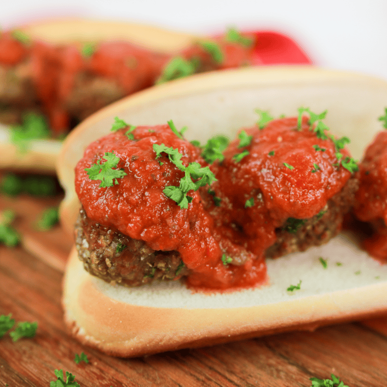 Golden, crispy Easy Air Fryer Cheese Stuffed Meatballs with gooey melted mozzarella inside.