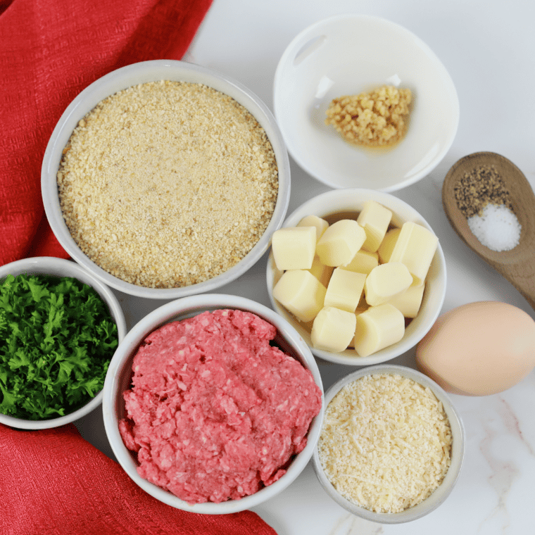 Ingredients needed for Easy Air Fryer Cheese Stuffed Meatballs on kitchen table.