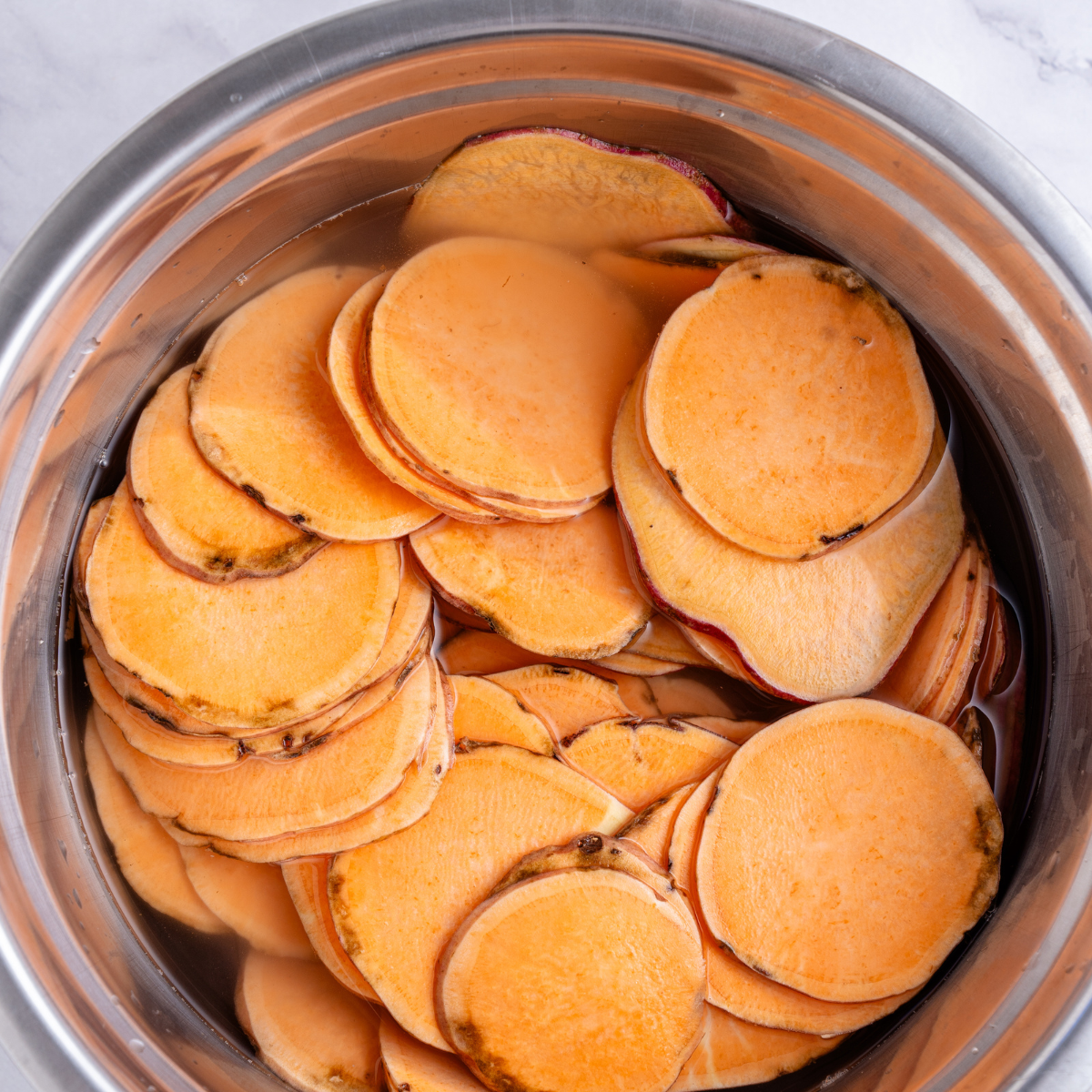 Soak chips in cold water, to remove the starch.