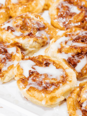 Freshly baked Panera-style cinnamon rolls topped with creamy icing.