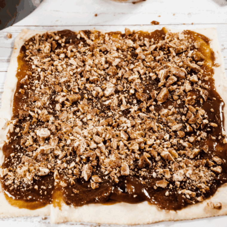 Drizzle the pecans over the top of the filling.