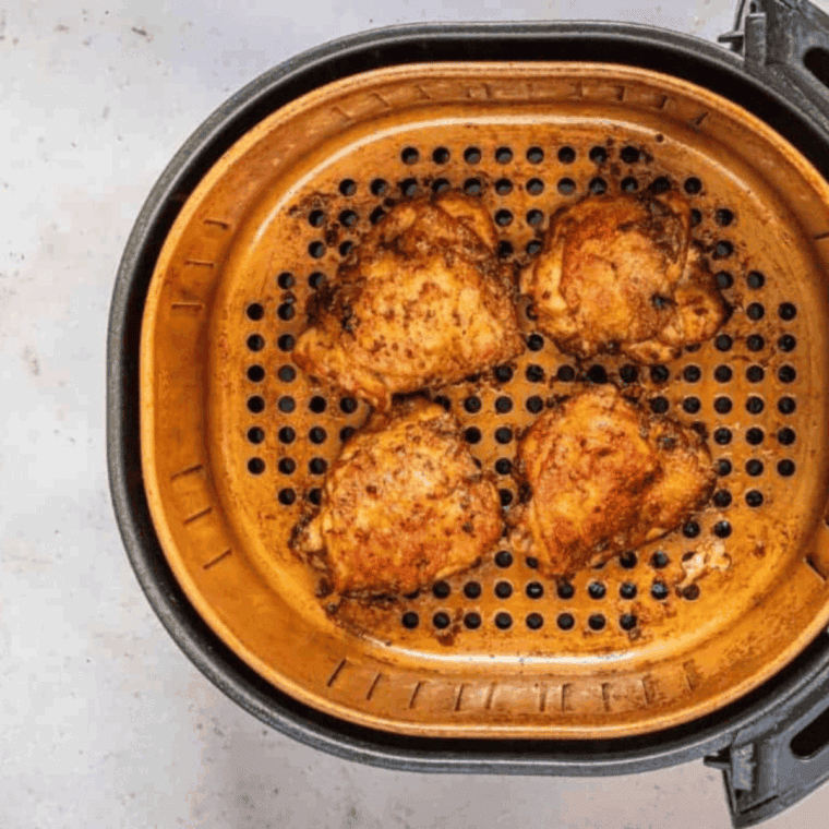 Preheat air fryer to 380°F, dry chicken thighs with paper towel.