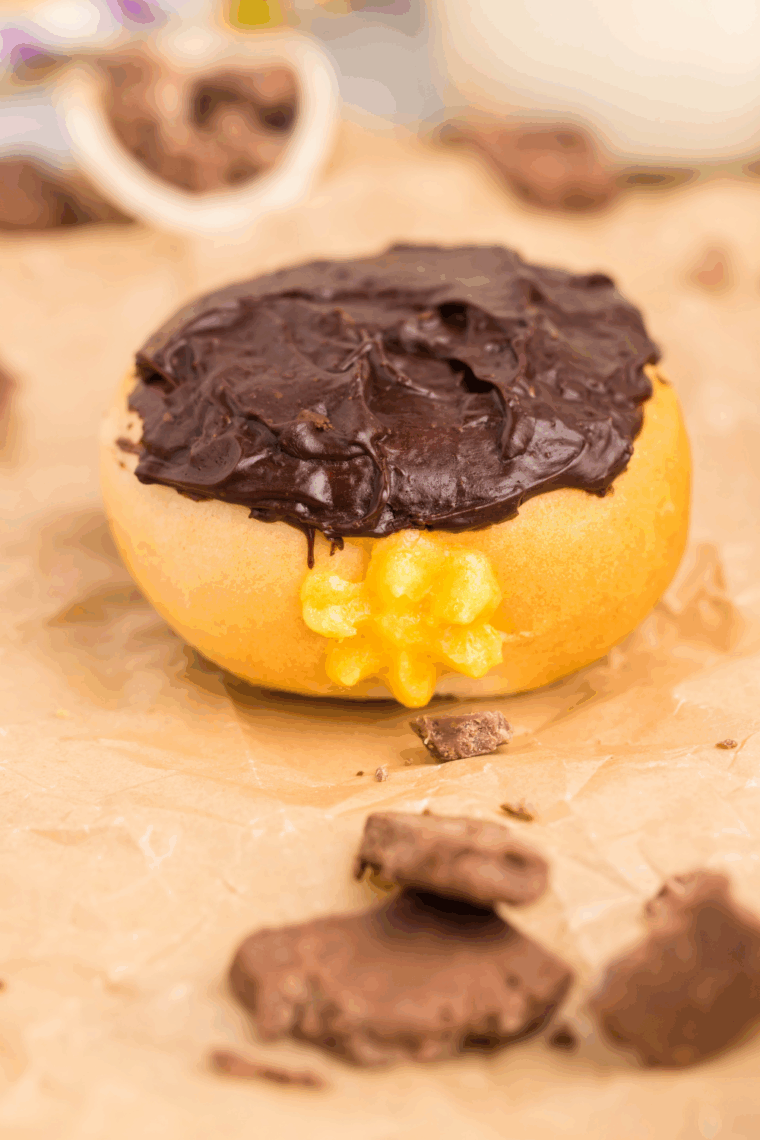 Air fryer Bavarian cream donuts filled with vanilla custard and drizzled with chocolate