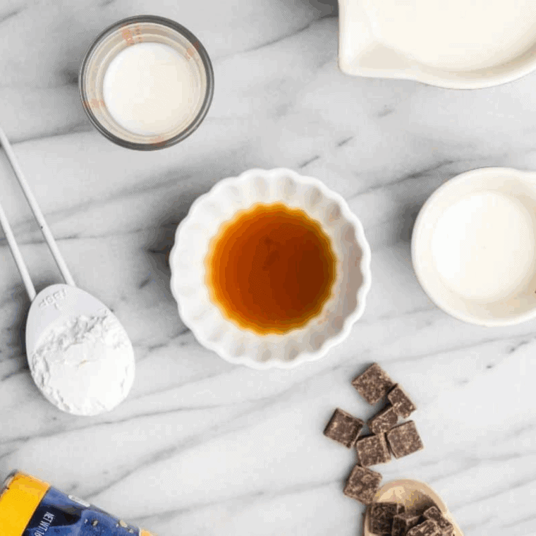 Ingredients needed for Air Fryer Bavarian Cream Donuts on kitchen table.