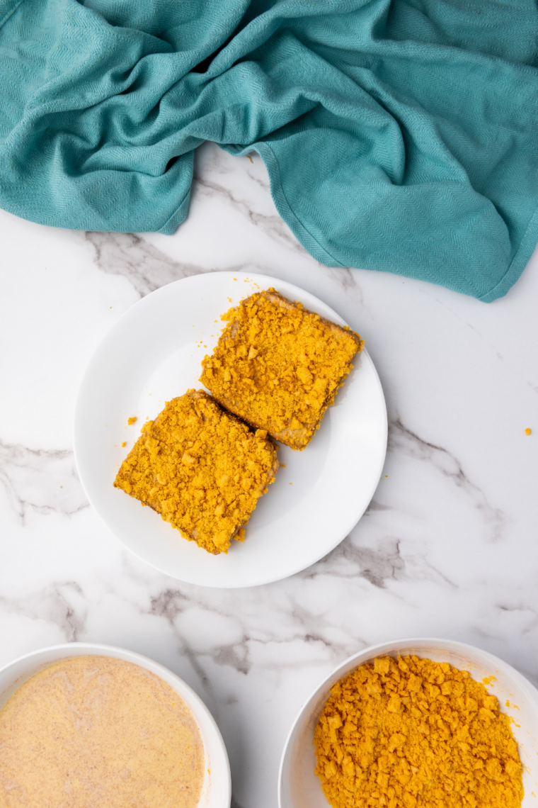 Prep the Air Fryer: Air fryer basket lightly greased and preheated, ready for French toast slices.