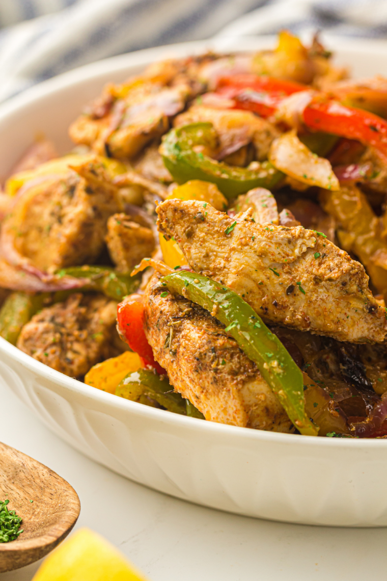Freshly cooked air fryer fajita veggies with charred peppers and caramelized onions.