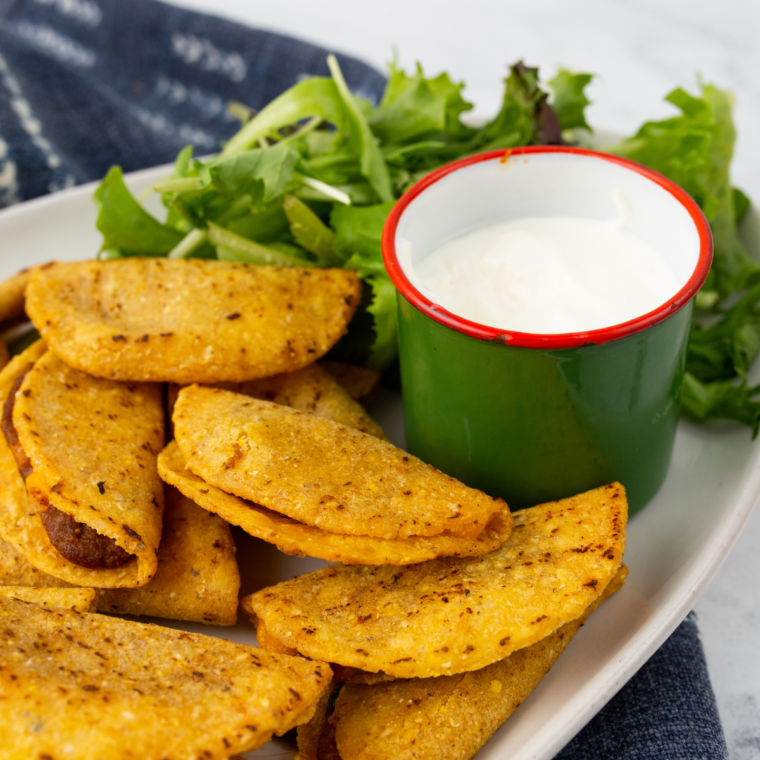 crispy air fryer frozen mini tacos golden crunchy bite size tacos on plate