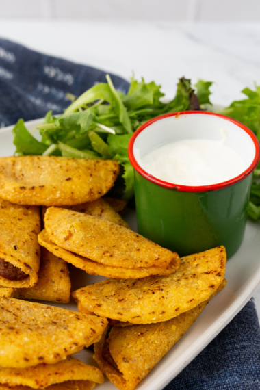 crispy air fryer frozen mini tacos golden crunchy shell on plate