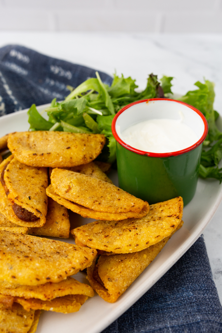 crispy air fryer frozen mini tacos golden crunchy bite sized tacos on plate