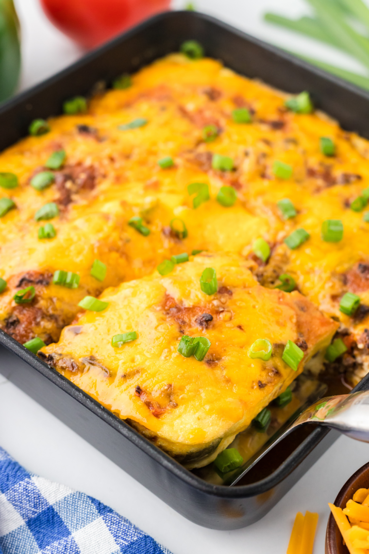 Air Fryer Taco Casserole with seasoned beef, eggs, cheese, and taco toppings, cooked to golden perfection in the air fryer.