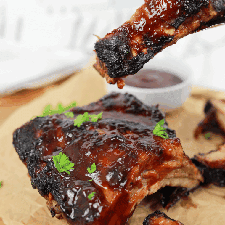 Homemade McDonald’s-style BBQ sauce coated over ribs.