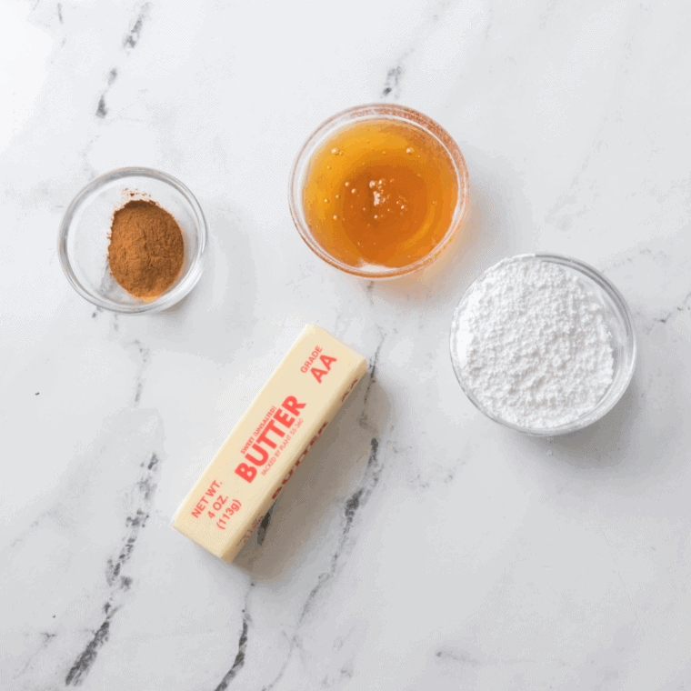 Ingredients needed for Copycat Texas Roadhouse Butter on kitchen table.