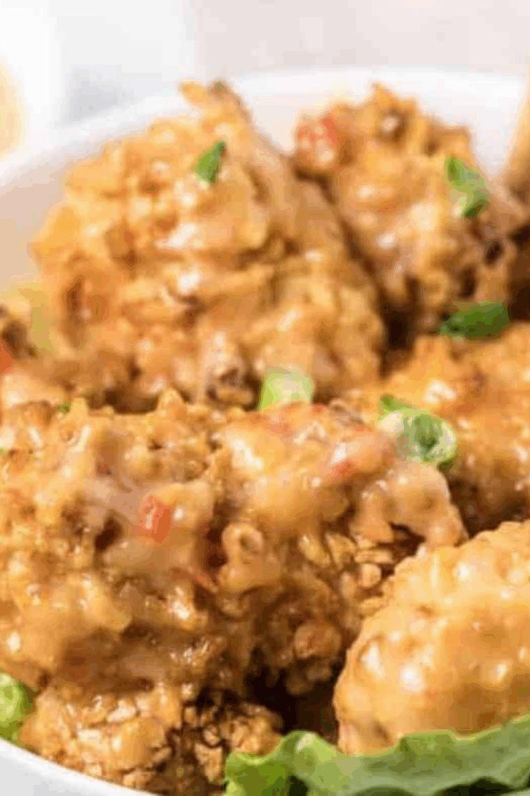 Small bowl with easy 3-ingredient Bang Bang Sauce, creamy and vibrant, ready to serve.