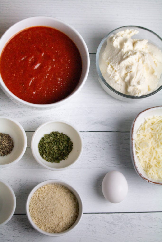 Ingredients required for air-fried meatballs on kitchen table.