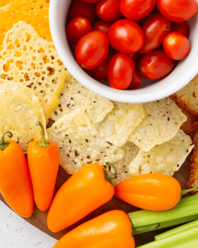 Have you tried making keto cheese crackers in your air fryer? They are SO good and SO easy to make! Just 4 ingredients and a few minutes in the air fryer is all it takes. You're going to love these cheesy, crispy crackers!
