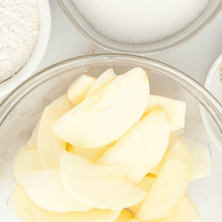 Apples cut into bite-sized pieces, brushed with butter and sprinkled with cinnamon.