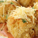 Close-up of crispy fried macaroni and cheese bites from the air fryer.