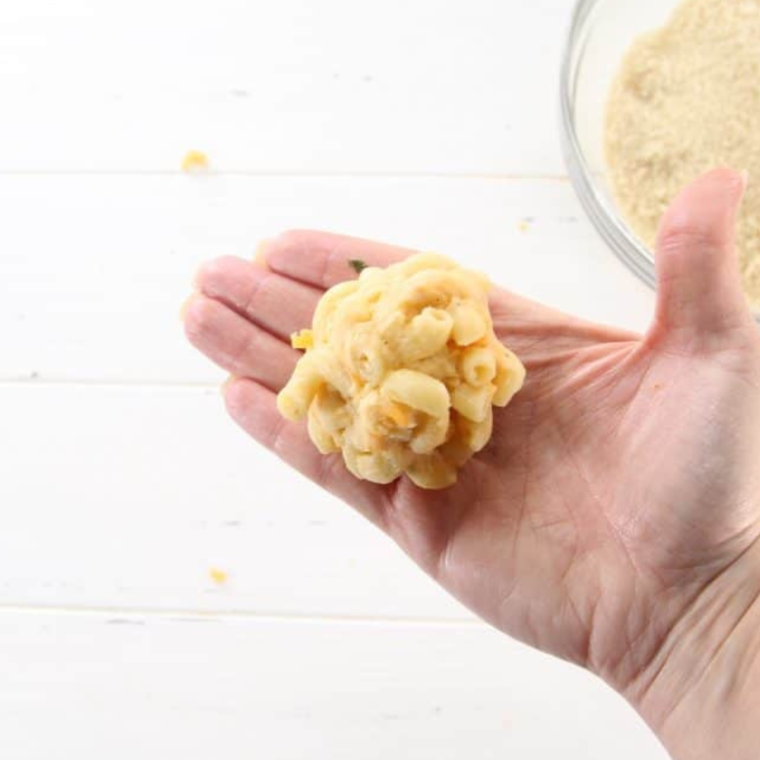 Creamy macaroni and cheese mixture ready for breading and frying.