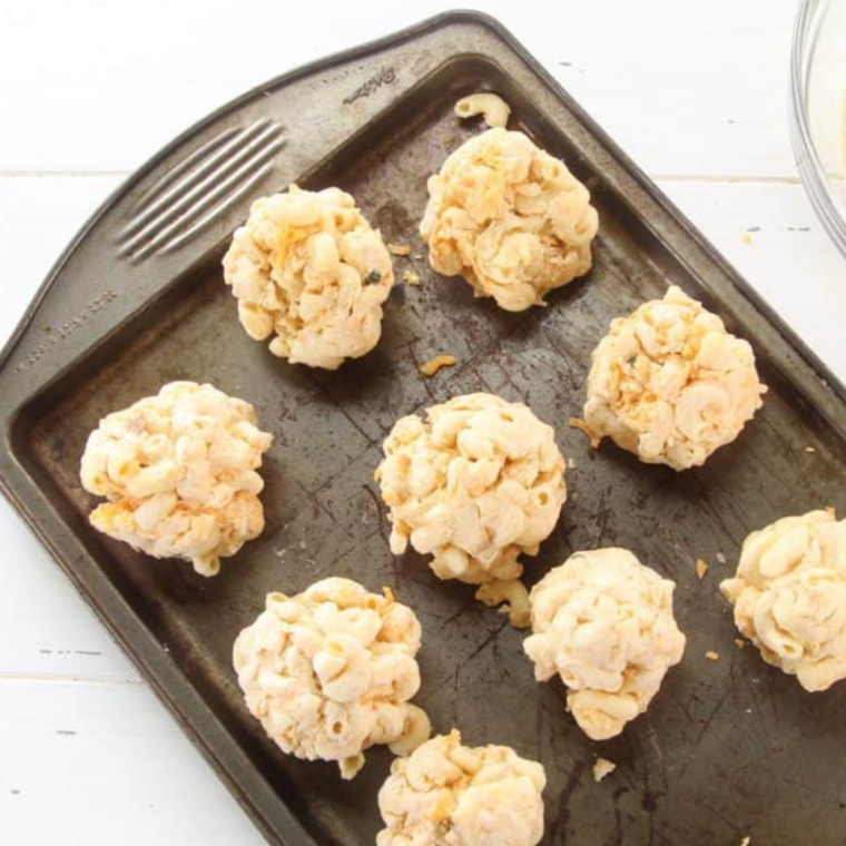 Macaroni and cheese balls coated with panko bread crumbs for a crispy texture.