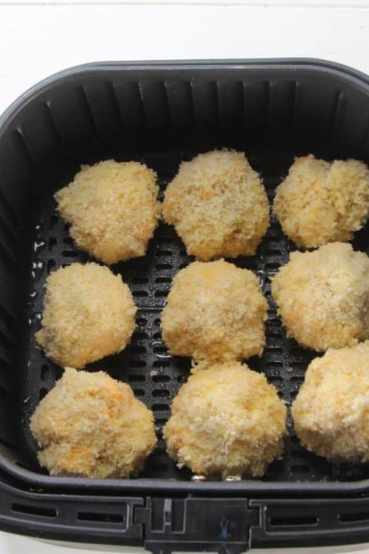 Place mac and cheese balls in air fryer basket.