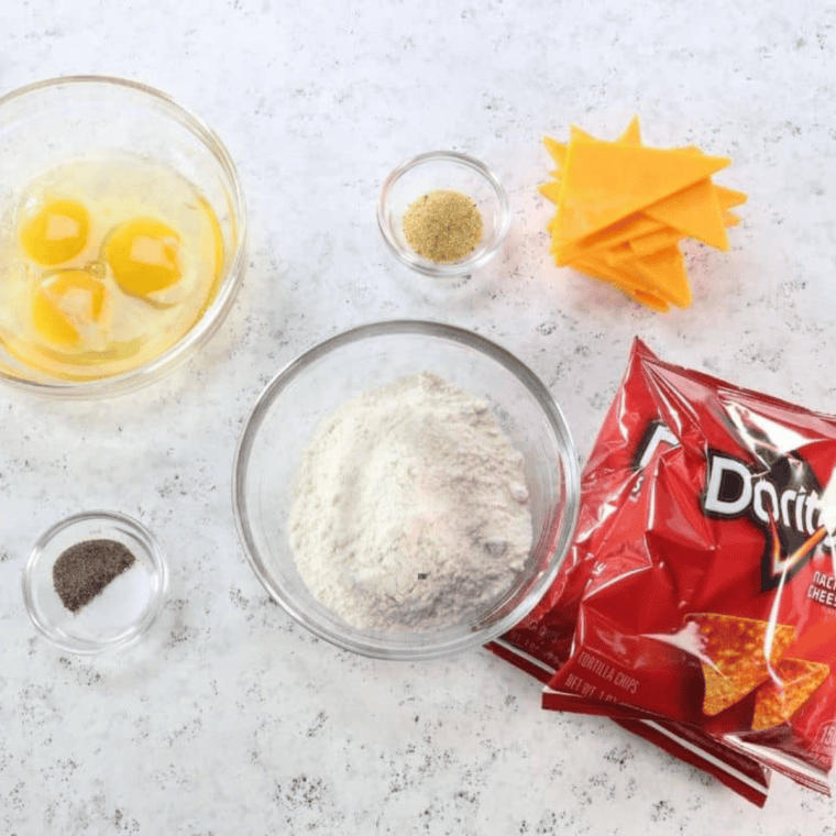 Ingredients needed for Air Fryer Cheesy Dorito Bombs on kitchen table.