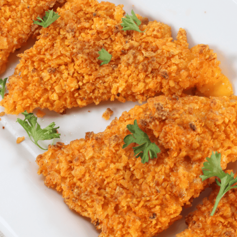 Golden, crispy Air Fryer Cheesy Dorito Bombs served on a plate, showcasing the cheesy, crunchy exterior and delicious filling.