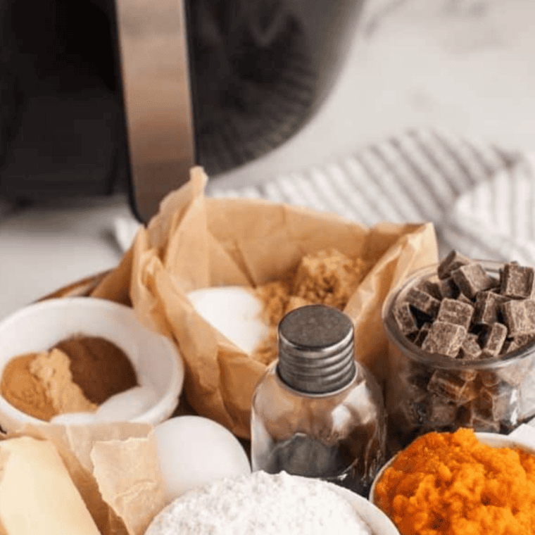 Ingredients needed for Air Fryer Pumpkin Cake Mix Cookies on kitchen table.
