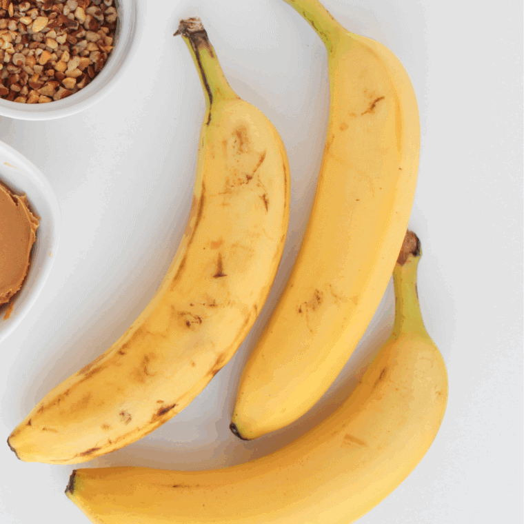 Ingredients needed for Air Fryer Weight Watchers Banana Bread Mug Recipe on kitchen table.
