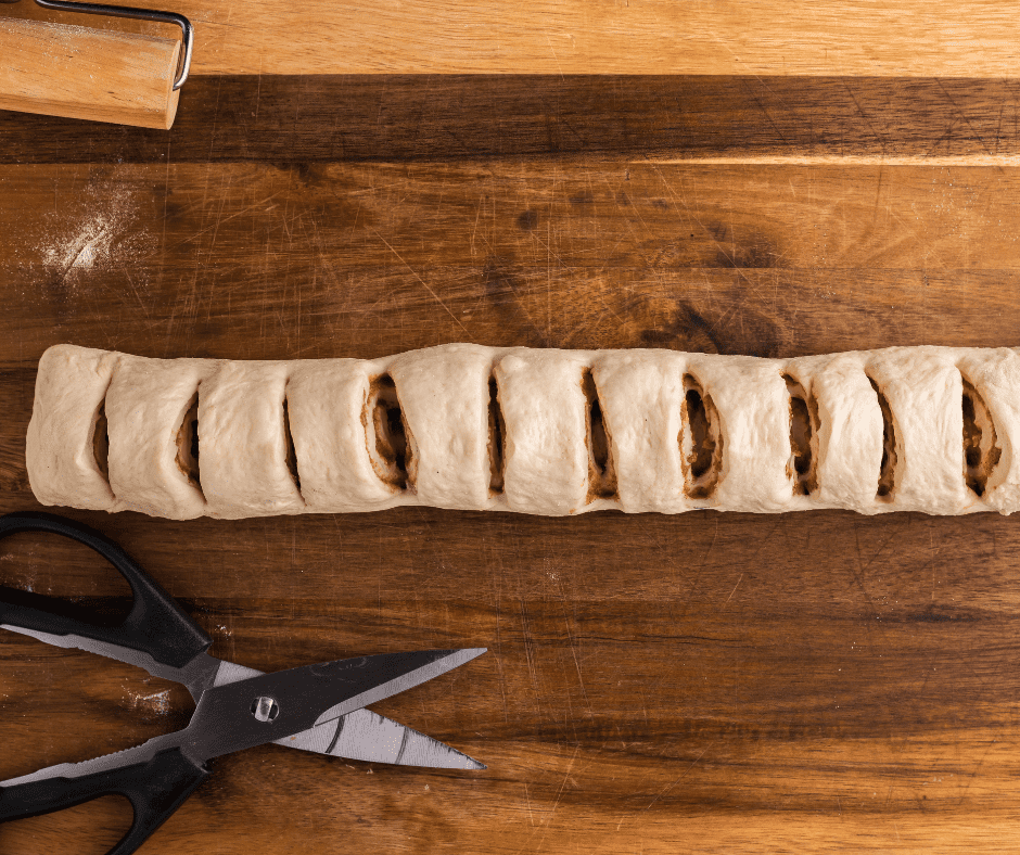 How To Cook Cinnamon Roll Braid In The Air Fryer Cut slits into the bread with shears