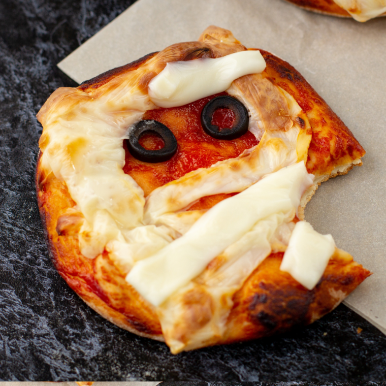 spooky easy mummy pizza in air fryer, Halloween themed dinner with cheese and olives