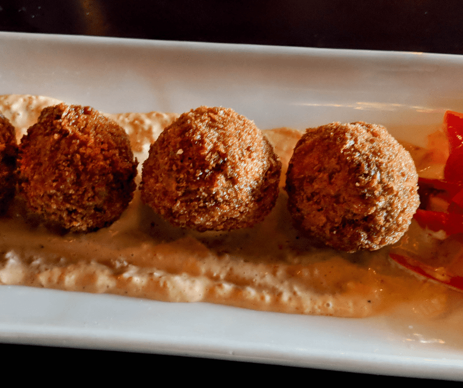 Air fryer boudin balls are a delicious and easy way to enjoy this classic Cajun dish. Made with pork, rice, and spices, boudin balls are typically deep-fried. However, air frying them gives them a crispy exterior without all the extra oil. And, since they're bite-sized, they're perfect for popping in your mouth! Best of all, they can be made ahead of time and frozen for a quick and easy snack or appetizer. Simply reheat in the air fryer when you're ready to enjoy. So next time you're in the mood for something different, give Air Fryer Boudin Balls a try - you won't be disappointed!