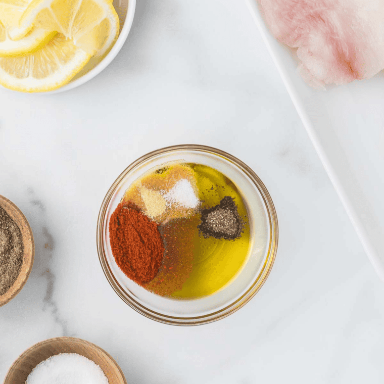 Prep the Fish: Whole branzino and fillets rinsed, patted dry, with diagonal slits scored on each side.