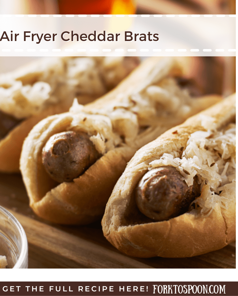 Close up of cooked cheese brats with overlay text reading "air fryer cheddar brats"