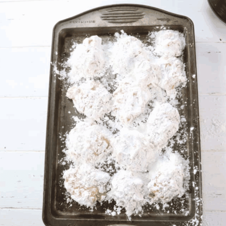 Place chicken nuggets formed onto a baking sheet.