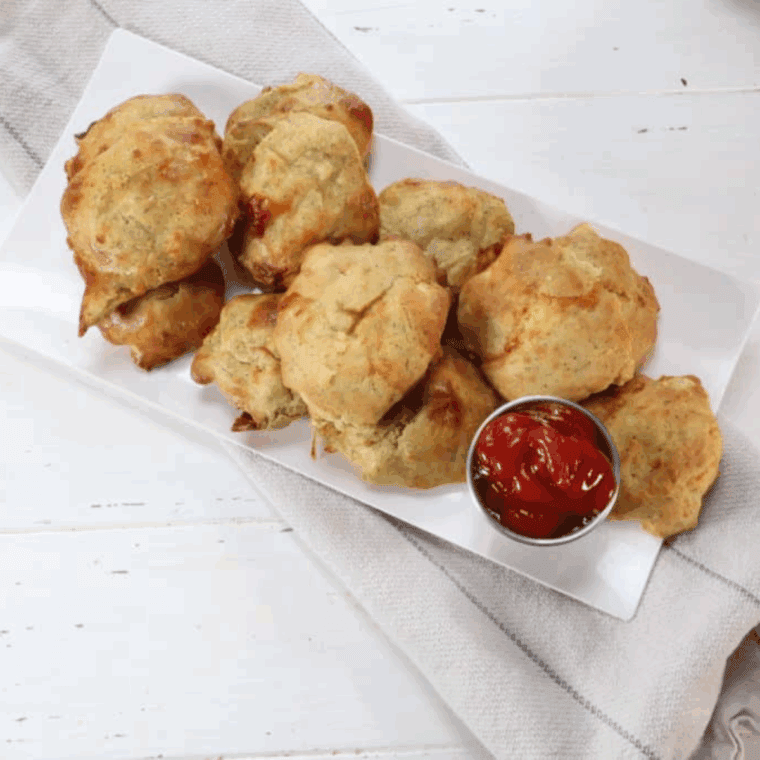 Plate of Air Fryer Copycat McDonald’s Chicken Nuggets on kitchen table.