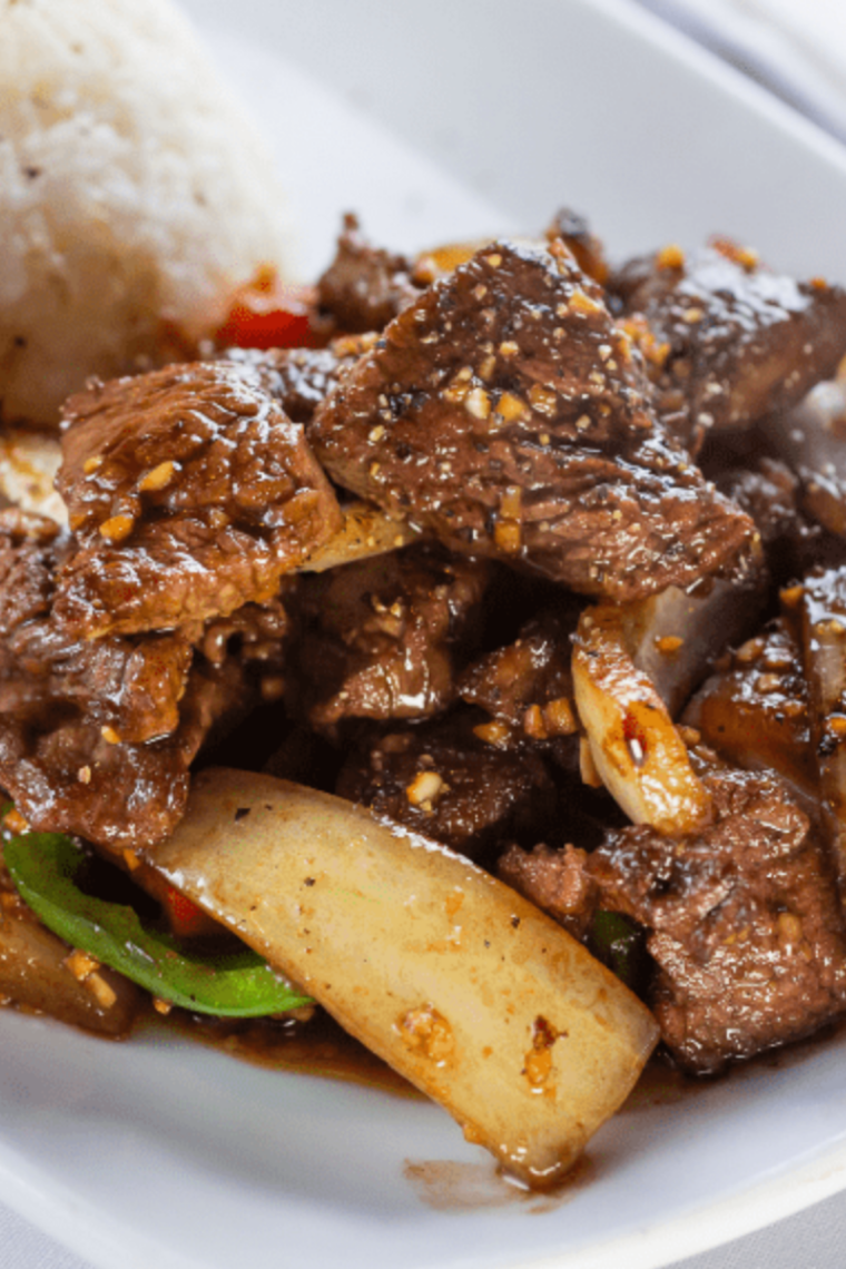 Air fryer cube steak cooked golden brown on a plate tender juicy beef steak ready in 15 minutes quick dinner recipe.