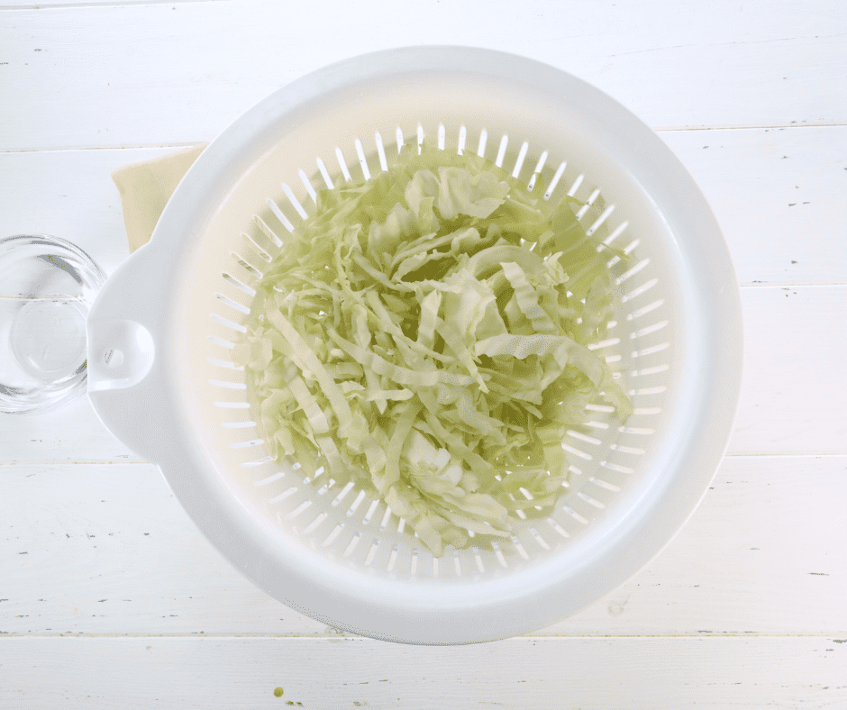 cut cabbage in colander