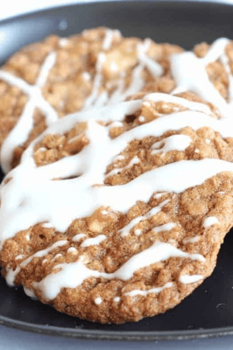 Freshly baked soft and chewy air fryer apple cinnamon oatmeal cookies on cooling rack