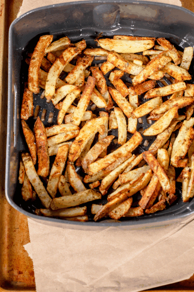 Cheesecake Factory Copycat Parmesan Truffle Fries with golden, crispy fries tossed in truffle oil, garlic, and grated Parmesan.