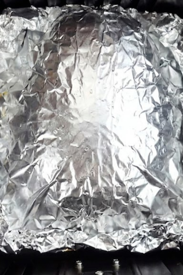Foil opened on brisket in air fryer at 400&deg;F to caramelize glaze and crisp the surface.