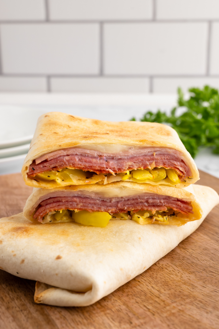 Soft, warm tortillas stacked on a plate, ready to serve.