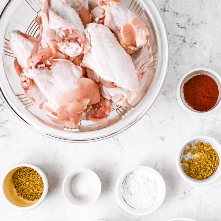 Ingredients needed for Easy Wingstop Hot Honey Rub Wings on kitchen table.